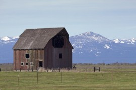 Old barn and mountains
