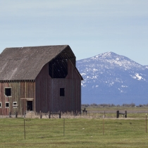Old barn and mountains