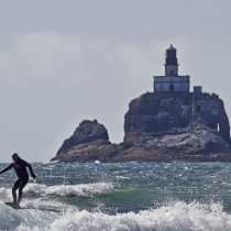 Tillamook Lighthouse and surfer